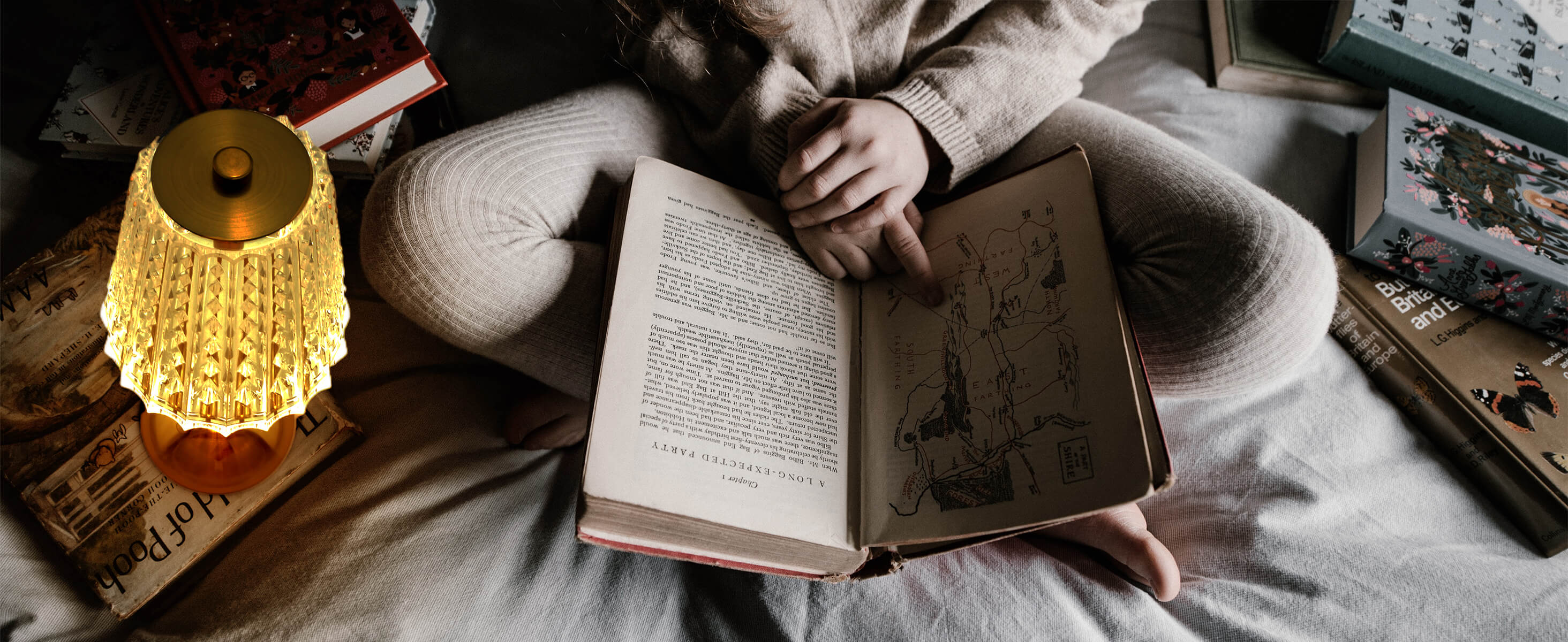 Cordless-Rechargeable-Battery, Modern-Gold-Amingulry lamp, a girl is reading on the bed with the light.