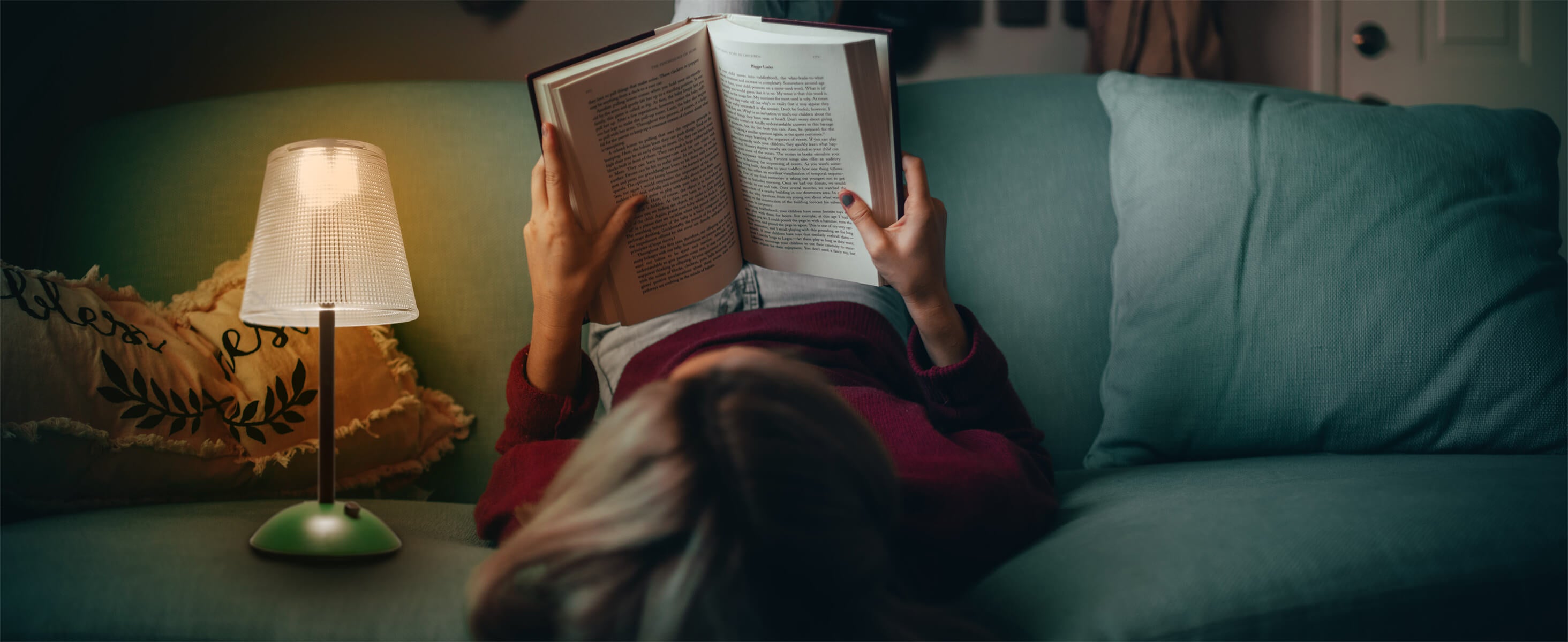 Cordless-Rechargeable-Battery, Retro-Green-Amingulry lamp, a girl is reading on the bed with the light.